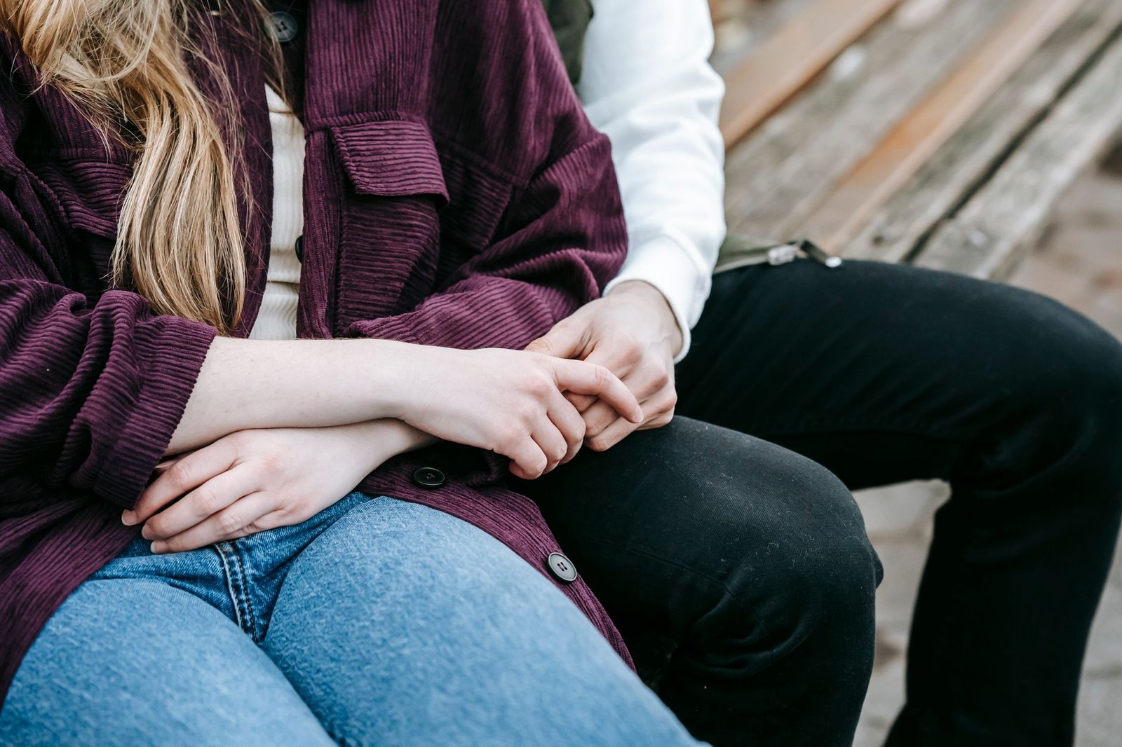 gentle loving young couple holding hands
