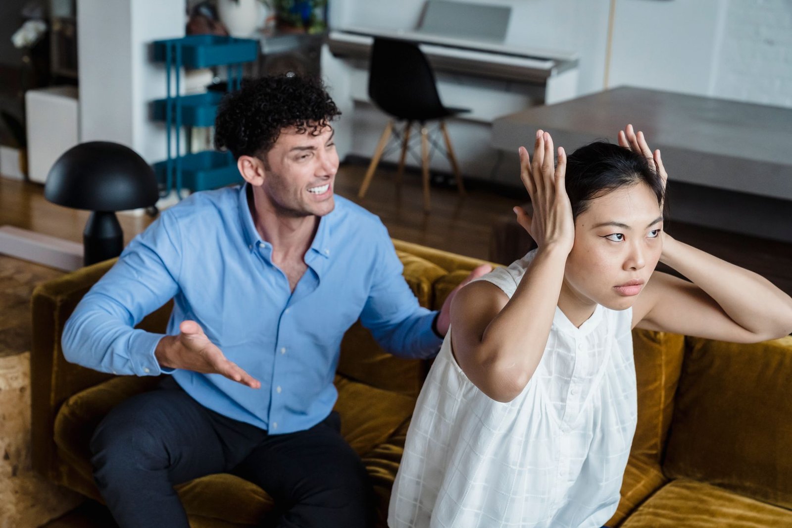 man shouting at woman