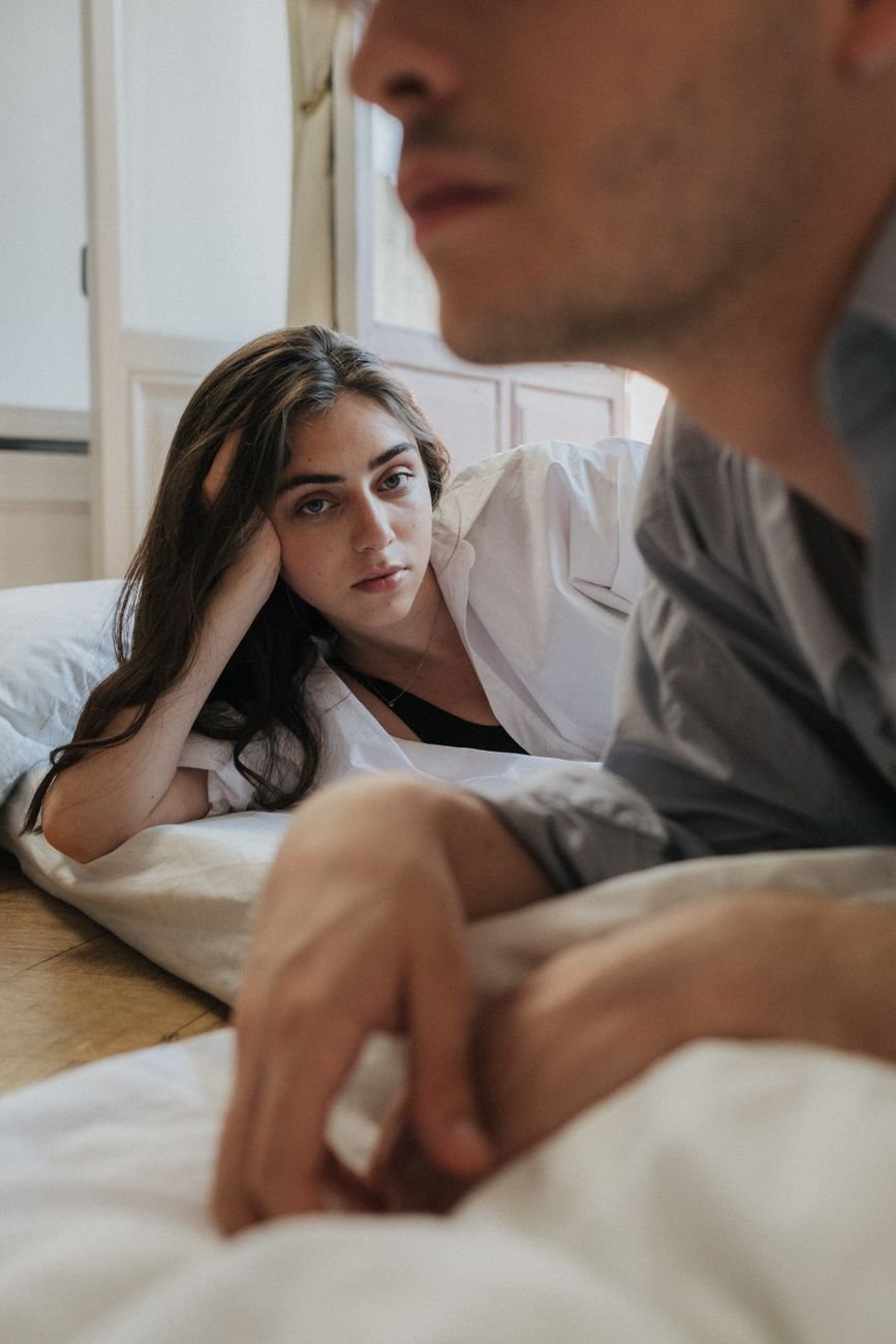 a woman with a distant look and feeling unloved