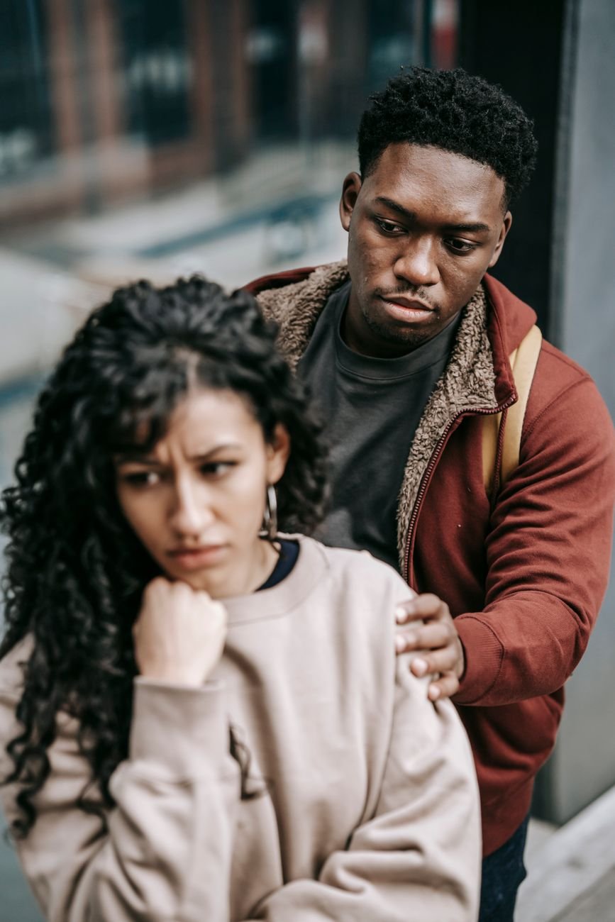 multiethnic couple having disagreement in street
