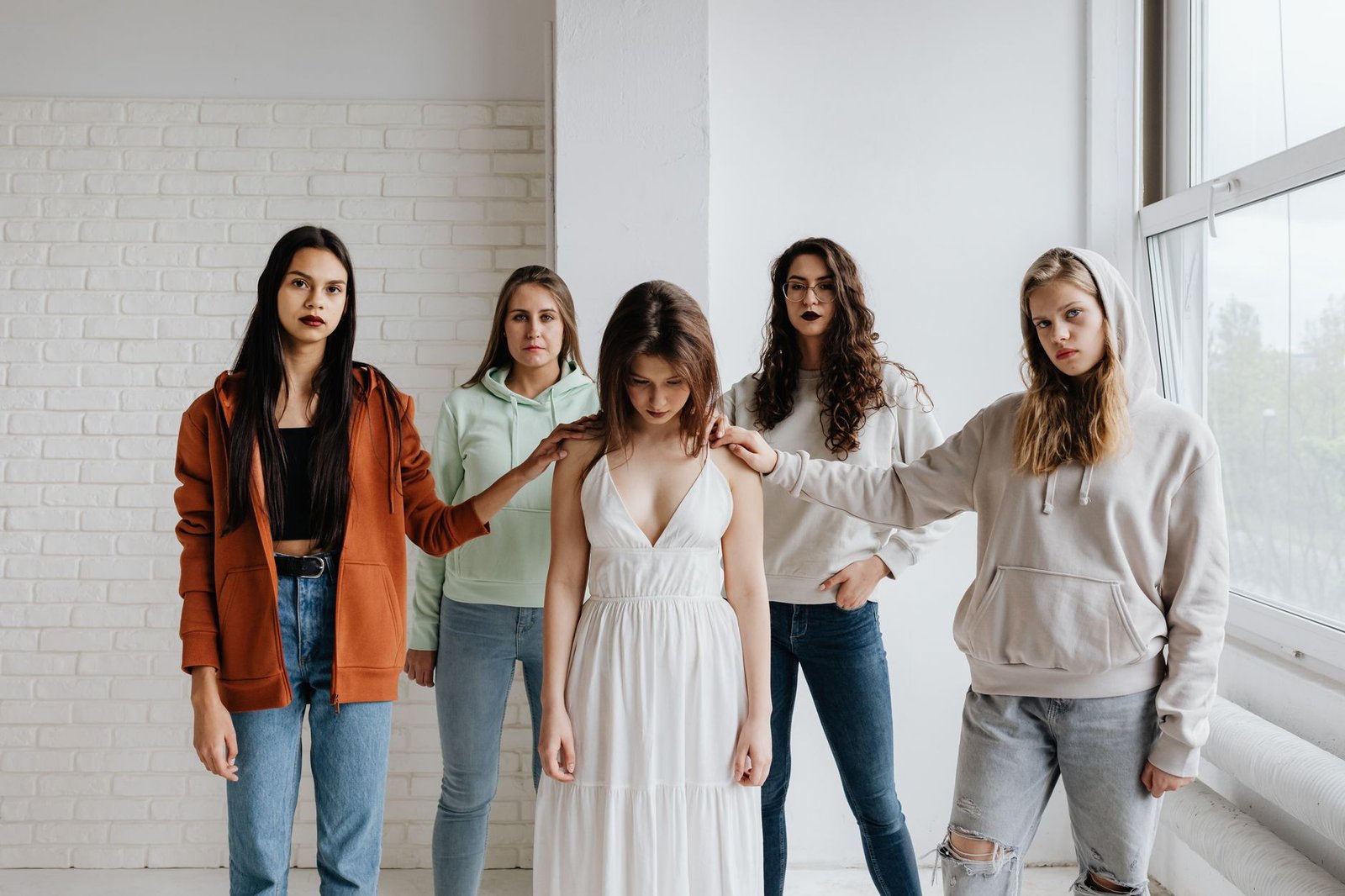 five women standing together